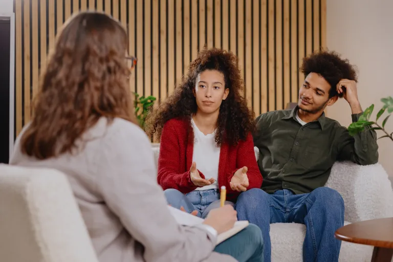 Couple in a counseling session with a therapist