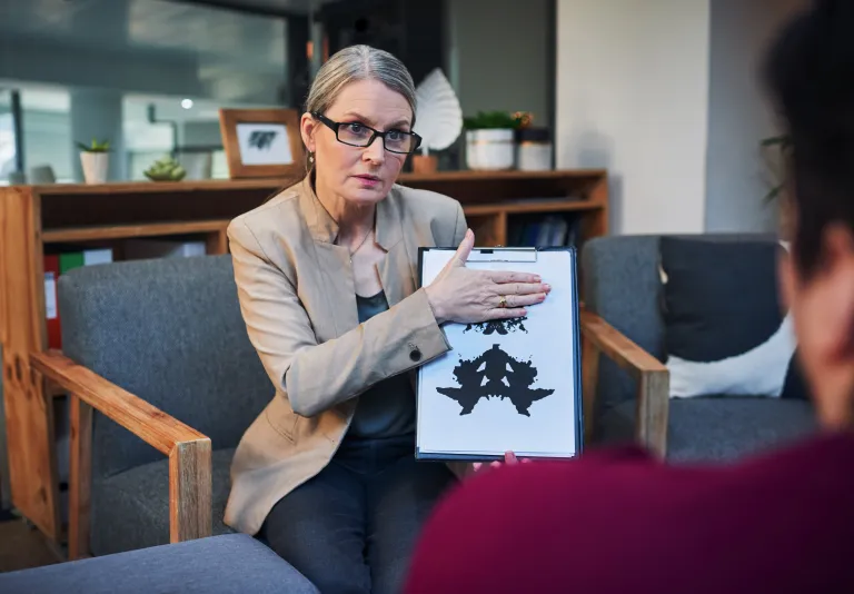 Psychologist conducting a psychological assessment with a client