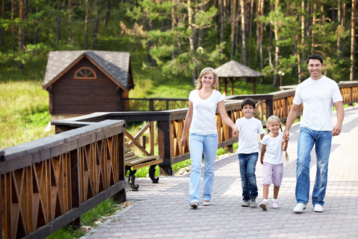Happy family outdoor wellness