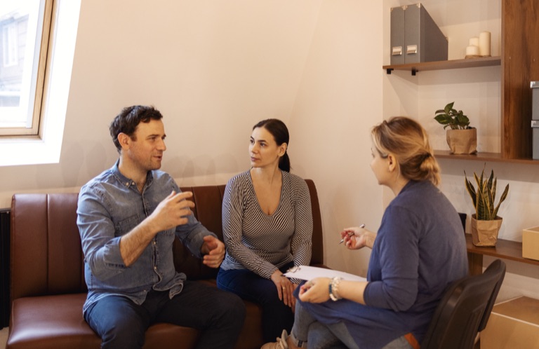 Couple improving communication during therapy at ZipHealthy