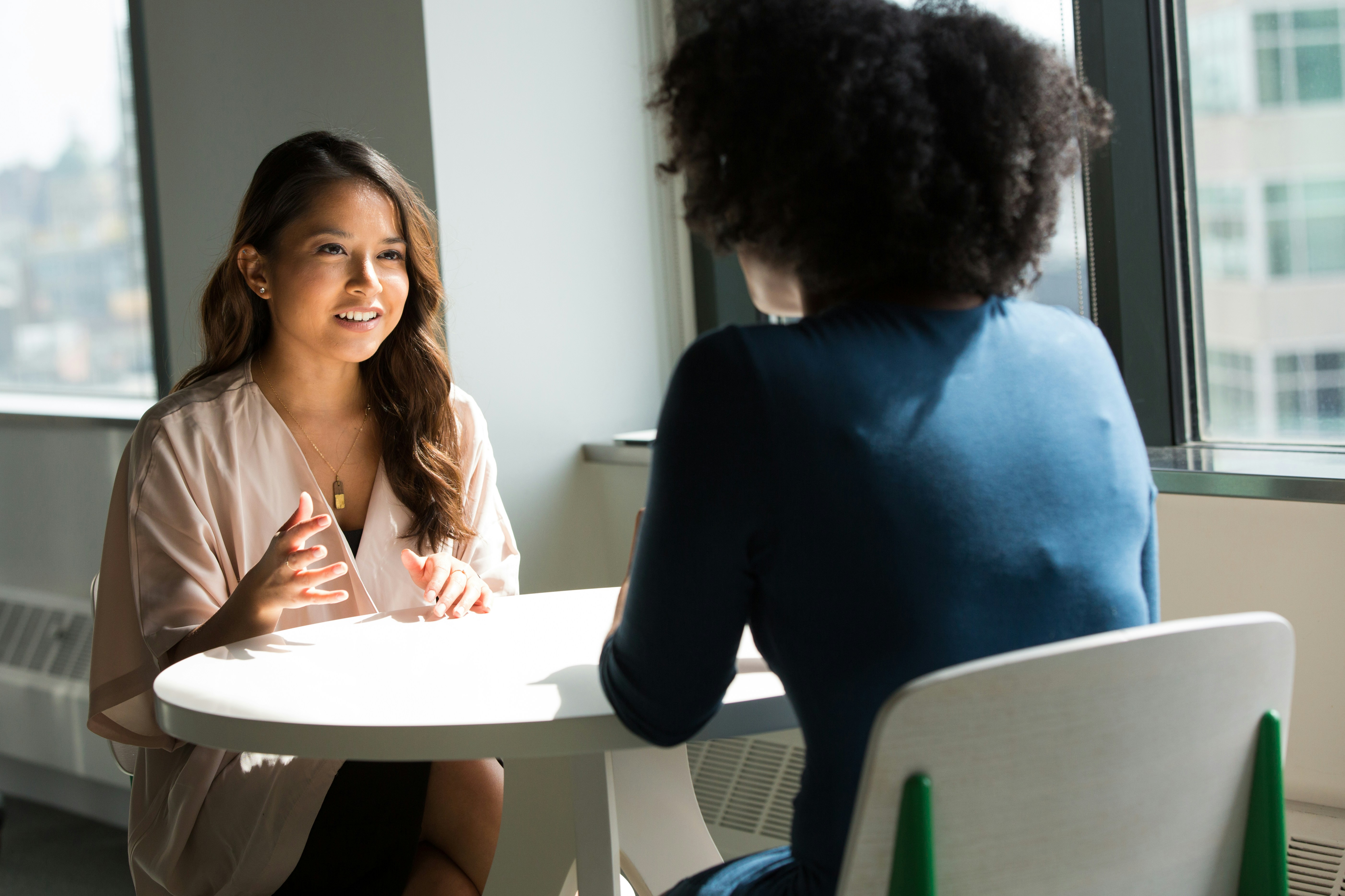 Therapist consulting with a college student
